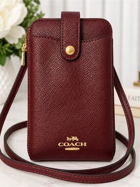 COACH Maroon Textured Leather Crossbody Phone Pouch with Gold Logo